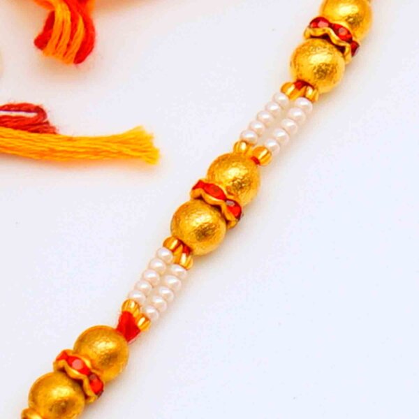 Gold bead rakhi