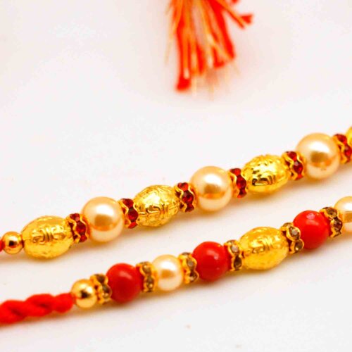 Red and  gold beaded rakhi pair
