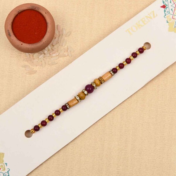Elegant golden and brown beads rakhi