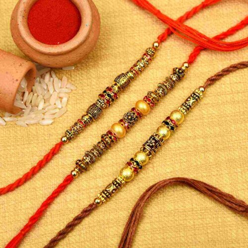 Set of 3 metallic finish beads & pearl rakhi