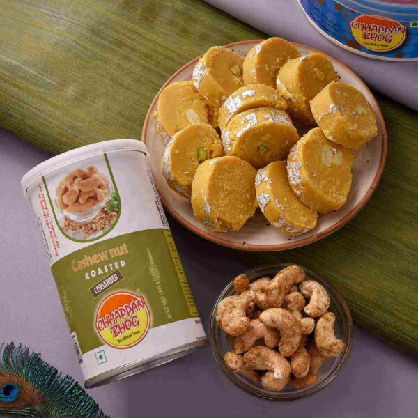 Batisa Slice with Coriander Flavoured Roasted Cashewnuts and Elegant Om Ganesha Rakhi Set.