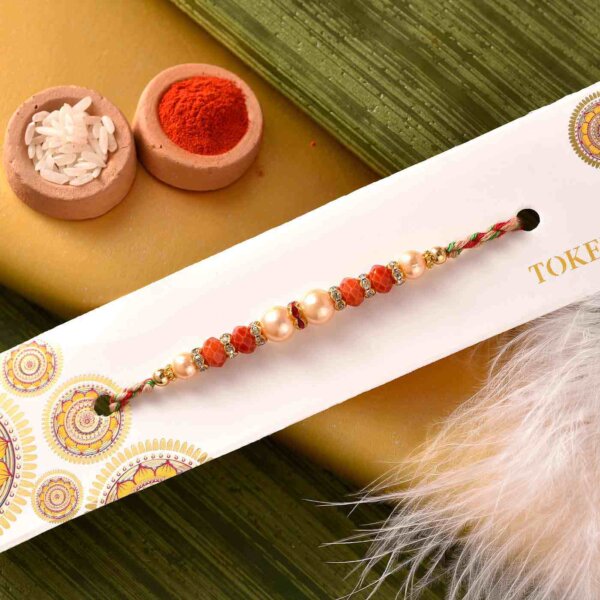 Mewa Bite with Exquisite Pearl and Beads Rakhi