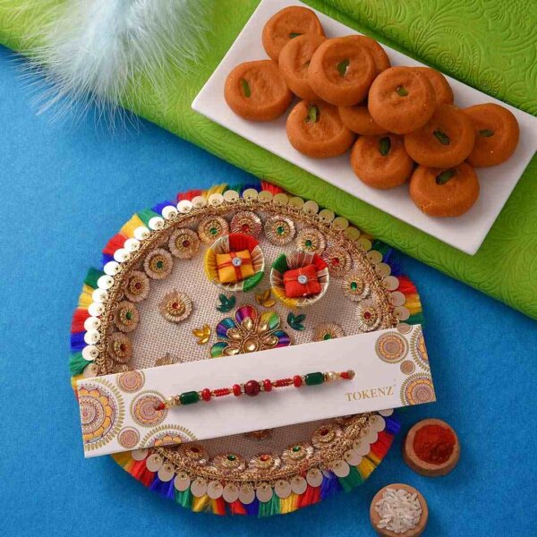 Unique Red-Green Rakhi with Kesar peda and thali.