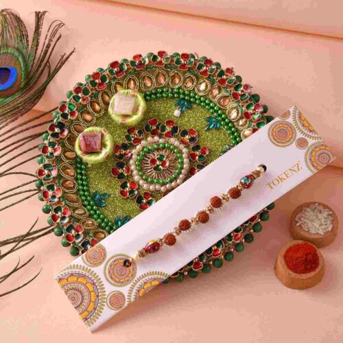 Elegant white beads and Rudraksh Rakhi with Kaju Barfi & 5inch Thali