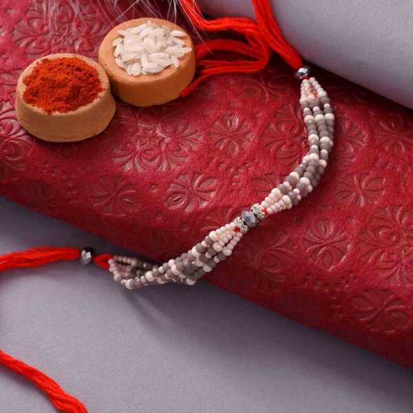 Mewa Bites with Unique Grey and White Beads Rakhi