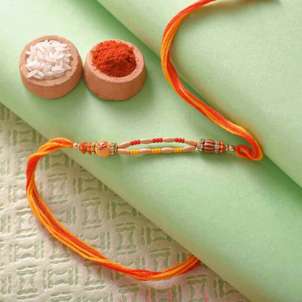 Pista Roll with Rudraksh and OM Rakhi- FOR USA