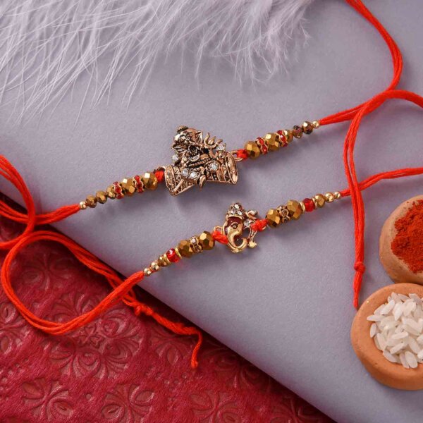 Mewa Bite with Antique Ganesha and Golden Beads Rakhi Set.