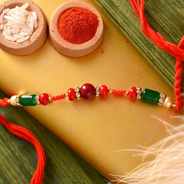Red round beads & Green Rakhi with 6 inch colorful thali