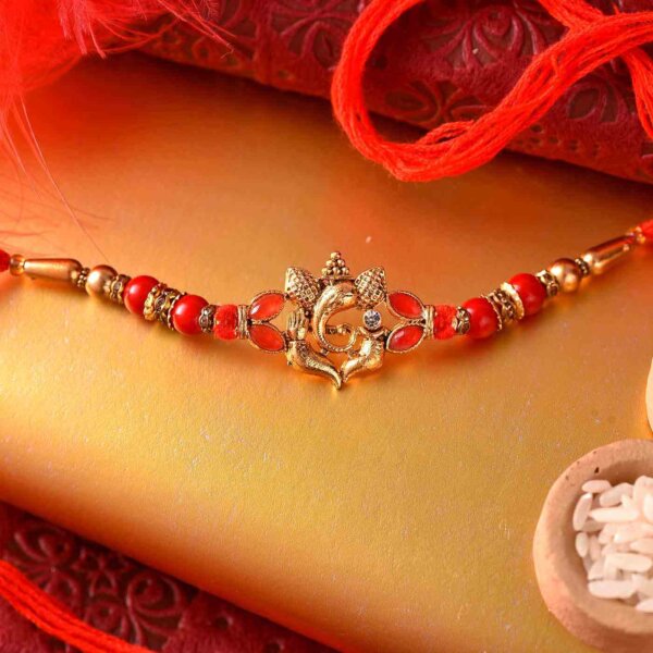 Traditional Golden color Ganesh rakhi