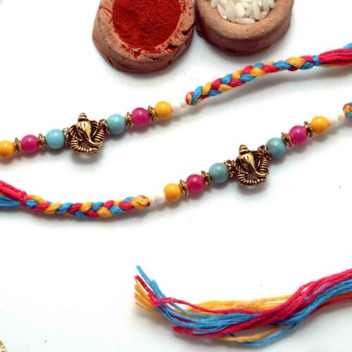 Enticing Ganesha Rakhi with colorful beads-Set of 2