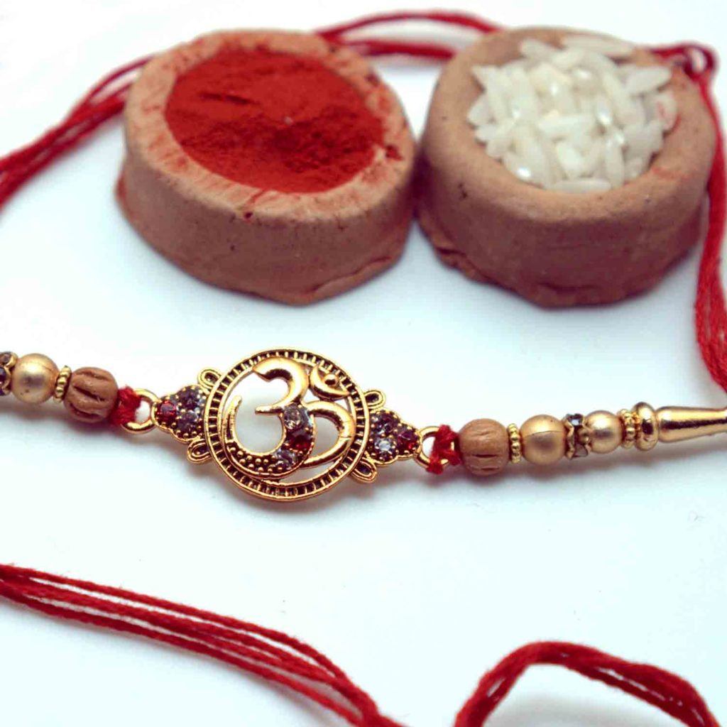 Home / Traditional Rakhi / Traditional Rakhi - USA / Blessed Om Rakhi