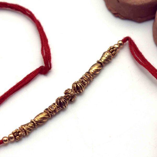 Golden Beads Rakhi