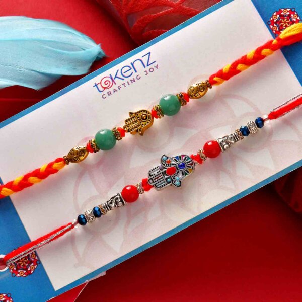 Set of 2 Designer Heavy-Work Rakhis With Handmade Chocolate Brownie (200 Gms), Chocolate Dipped Blueberry Dates (100 Gms)