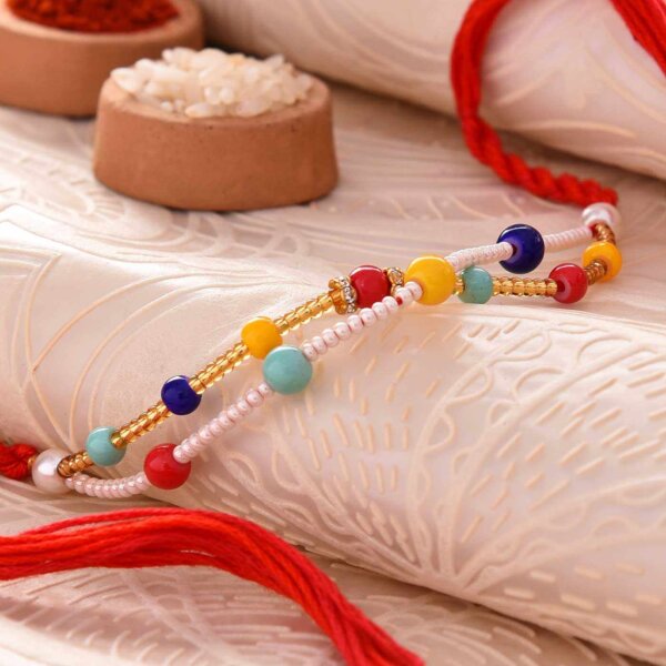 Colorful Pearls Rakhi With Golden & White Beads