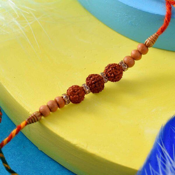 3 Beads Rudraksha Rakhi With An Interlaced Thread