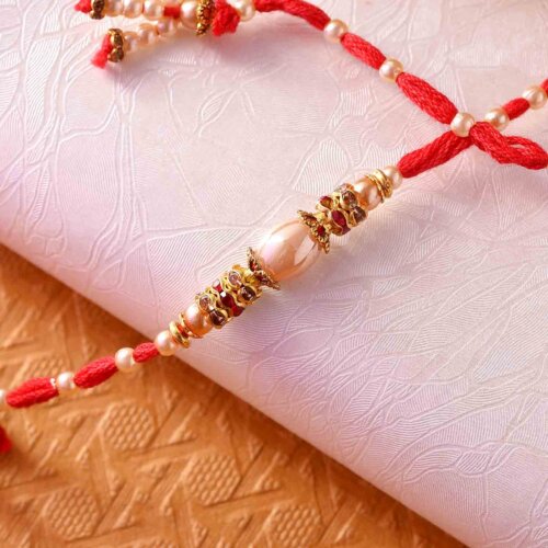 Metallic Gold Pearl Rakhi With Designer Thread