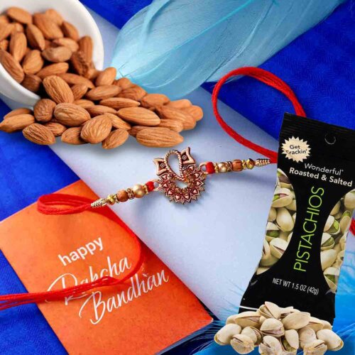 Ganesha rakhi with Natural Almonds 113 Gms and Wonderful Pistachio  84 Gms