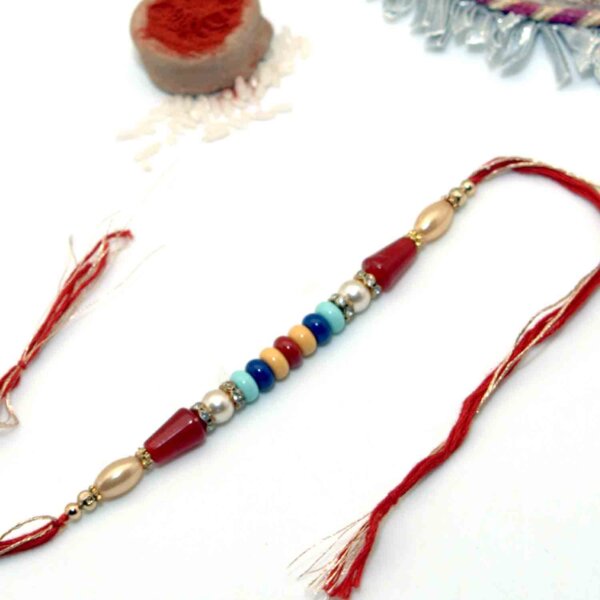 Colorful Beads Rakhi In A Dual-Toned Thread