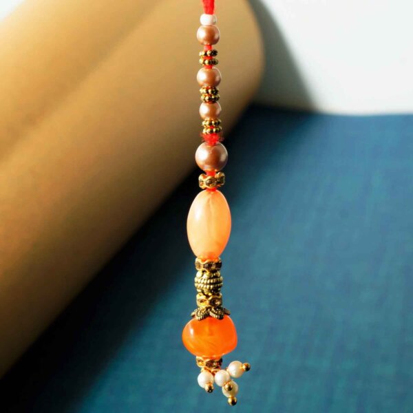 Elegant orange Rakhi Lumba Set
