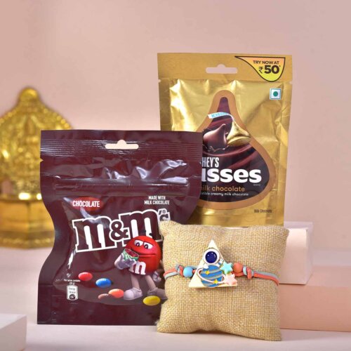Triangular Astronaut Rakhi with M&M and Kisses Chocolate
