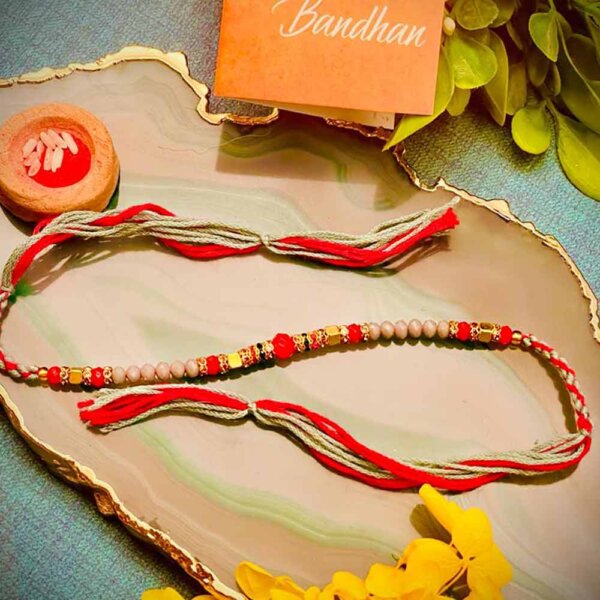 Set of 3 Beaded Rakhis with 12 pcs. Assorted Sweets