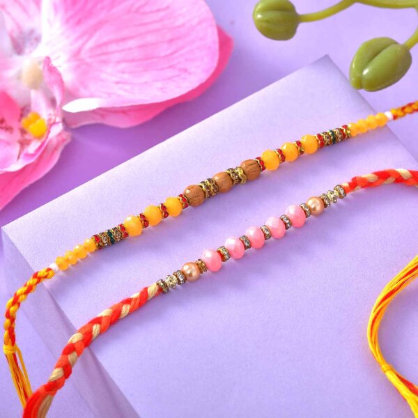 Set of 2 Colorful Beaded Rakhi with Choorma Laddo and Cashews