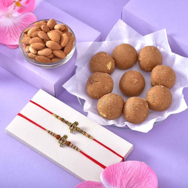 Set of 2 Om Rakhis with Choorma Laddoo and Almonds