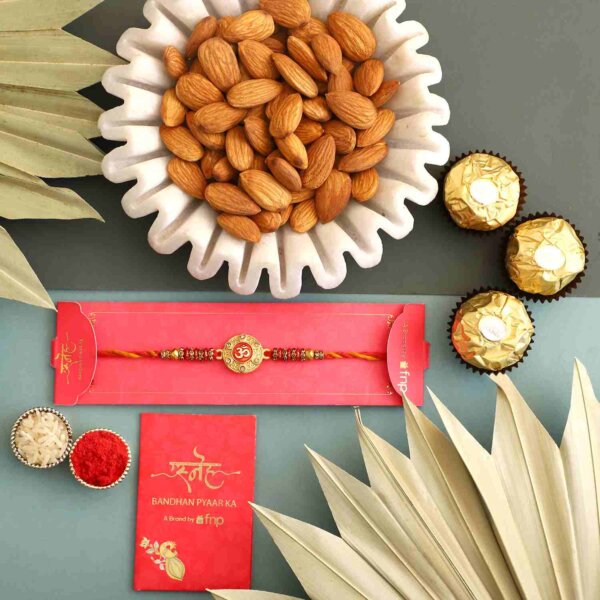 Sneh Traditional Om Rakhi with 3 Ferrero Rocher and Almonds