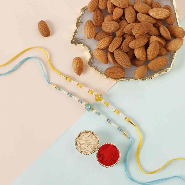 Sneh Vibrant Set Of 2 Pearl Rakhis with 250 Grams Almonds