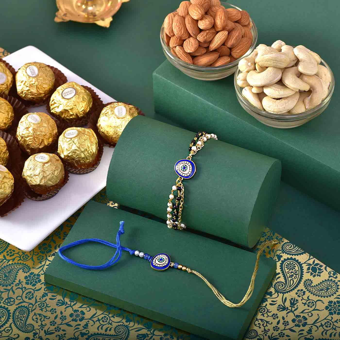 Evil Eyes Lumba Rakhi with 12pc ferrero rocher almonds And Cashew