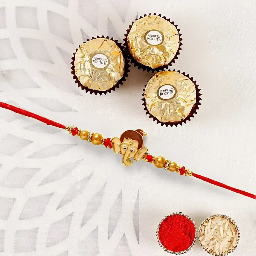 Long Trunk Bal Ganesha Pearl Rakhi For Kids And Mixed Fruits Long Trunk Bal Ganesha Pearl Rakhi For Kids And Mixed Fruits