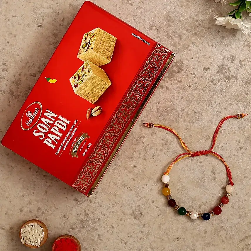 Navrattan Bracelet Pearl Rakhi And Soan Papdi Navrattan Bracelet Pearl Rakhi And Soan Papdi