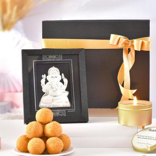 Silver Ganesha Frame with Fragrant Candle & Laddoo