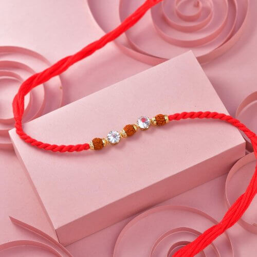 Rudraksha Shubh Red Designer Rakhi Rudraksha Shubh Red Designer Rakhi