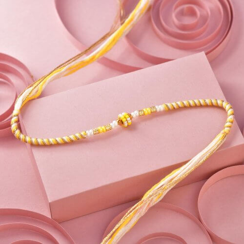 Yallow Designer beaded Rakhi Yallow Designer beaded Rakhi