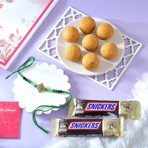 Ethnic Green Rakhi with Besan Laddoo anf 2 Snickers Bar Ethnic Green Rakhi with Besan Laddoo anf 2 Snickers Bar