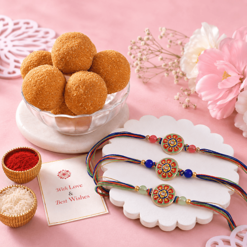 Rangoli Bloom Rakhi Set with Besan Laddoo Rangoli Bloom Rakhi Set with Besan Laddoo