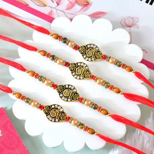 Om Rakhi Set Of Four Om Rakhi Set Of Four