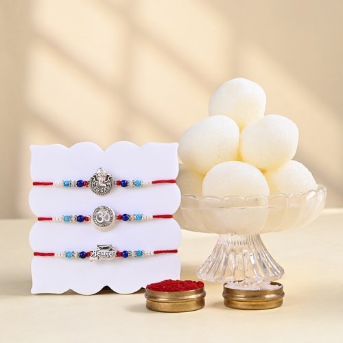 Divine Rakhi Trio With Rasgulla Divine Rakhi Trio With Rasgulla