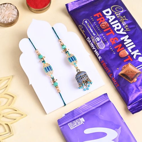 Pearl Ornate Bhai Bhabhi Rakhi Set With Chocolates Pearl Ornate Bhai Bhabhi Rakhi Set With Chocolates