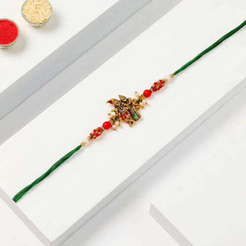 Sneh Gold Radha Krishna Pearl Rakhi Sneh Gold Radha Krishna Pearl Rakhi