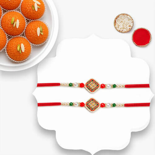 Elegant Ethnic Rakhi Set Of 2 With Motichoor Laddoo Elegant Ethnic Rakhi Set Of 2 With Motichoor Laddoo