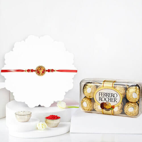 Royal Ganesha Rakhi With Ferrero Rocher 16 Pcs Royal Ganesha Rakhi With Ferrero Rocher 16 Pcs