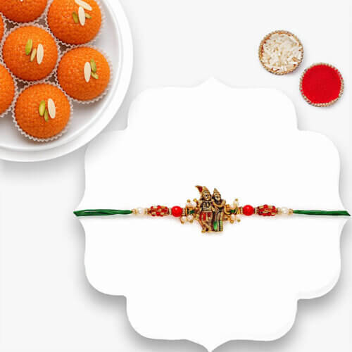 Sneh Gold Radha Krishna Pearl Rakhi With Motichoor Laddoo Sneh Gold Radha Krishna Pearl Rakhi With Motichoor Laddoo